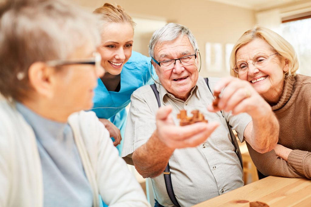 Older people playing a game together and having fun.